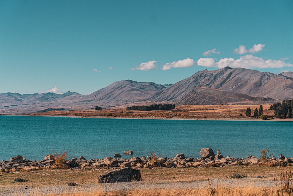 a large body of water surrounded by mountains