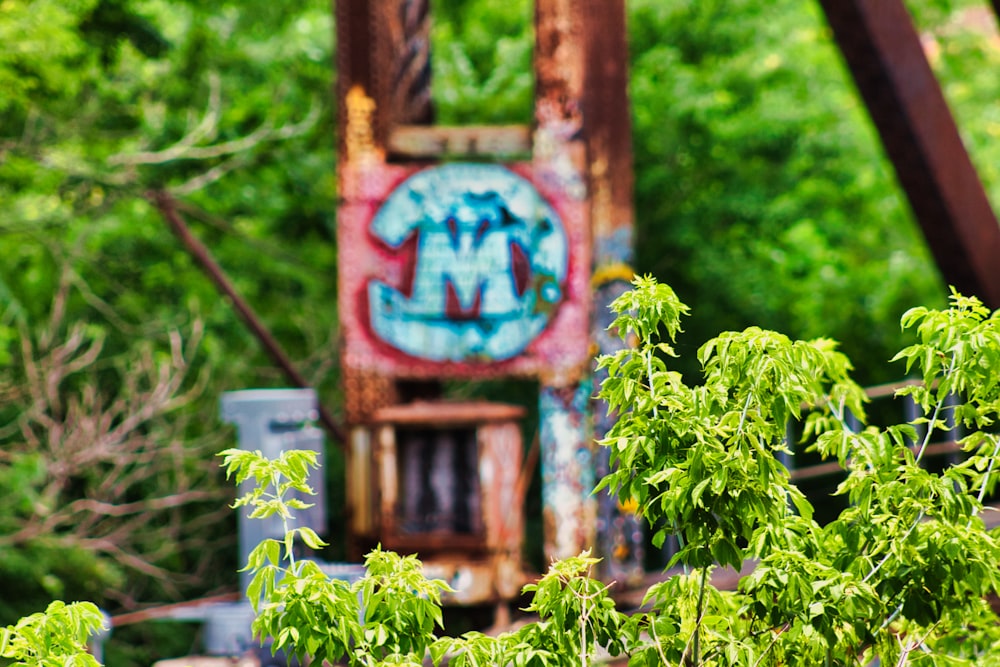 an old rusted bridge with graffiti on it