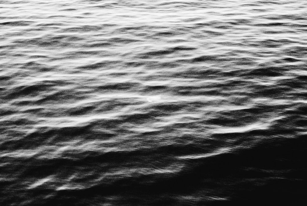 a black and white photo of a body of water