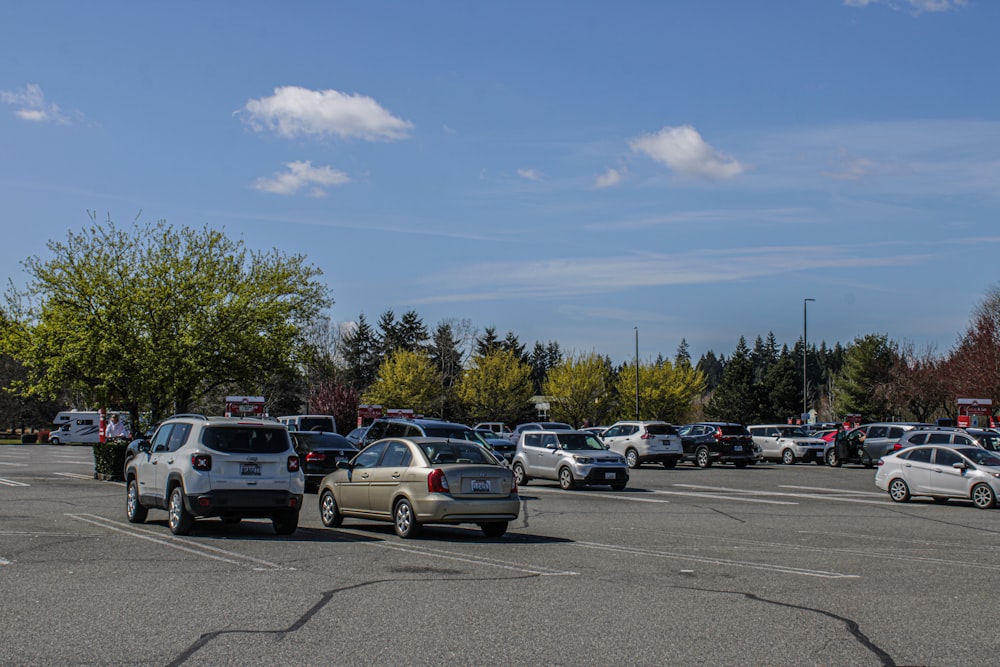 a parking lot filled with lots of parked cars