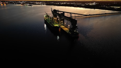 a large boat floating on top of a large body of water