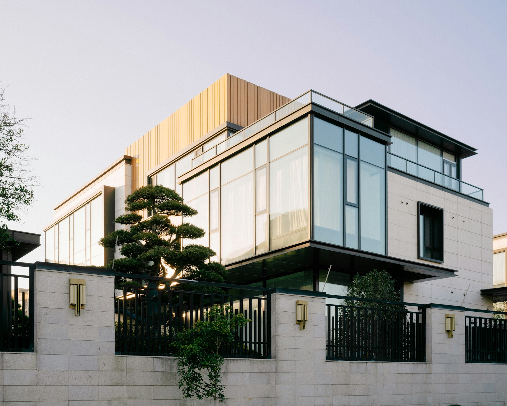 a building with a tree in front of it