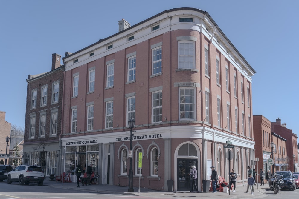 a large brick building sitting on the corner of a street