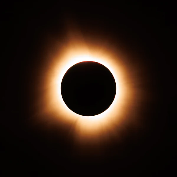 A total solar eclipse revealing the Sun's corona, the outer atmosphere that feeds the solar wind