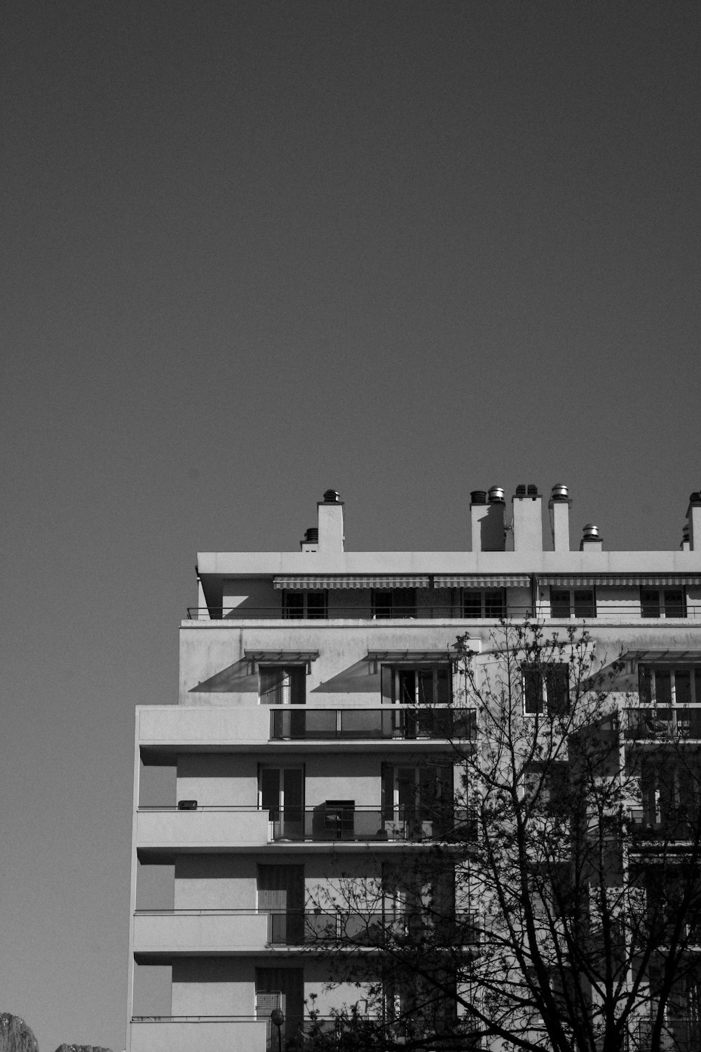 a black and white photo of a tall building