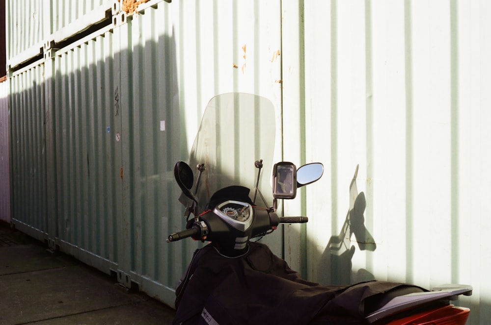 a motorcycle parked in front of a building