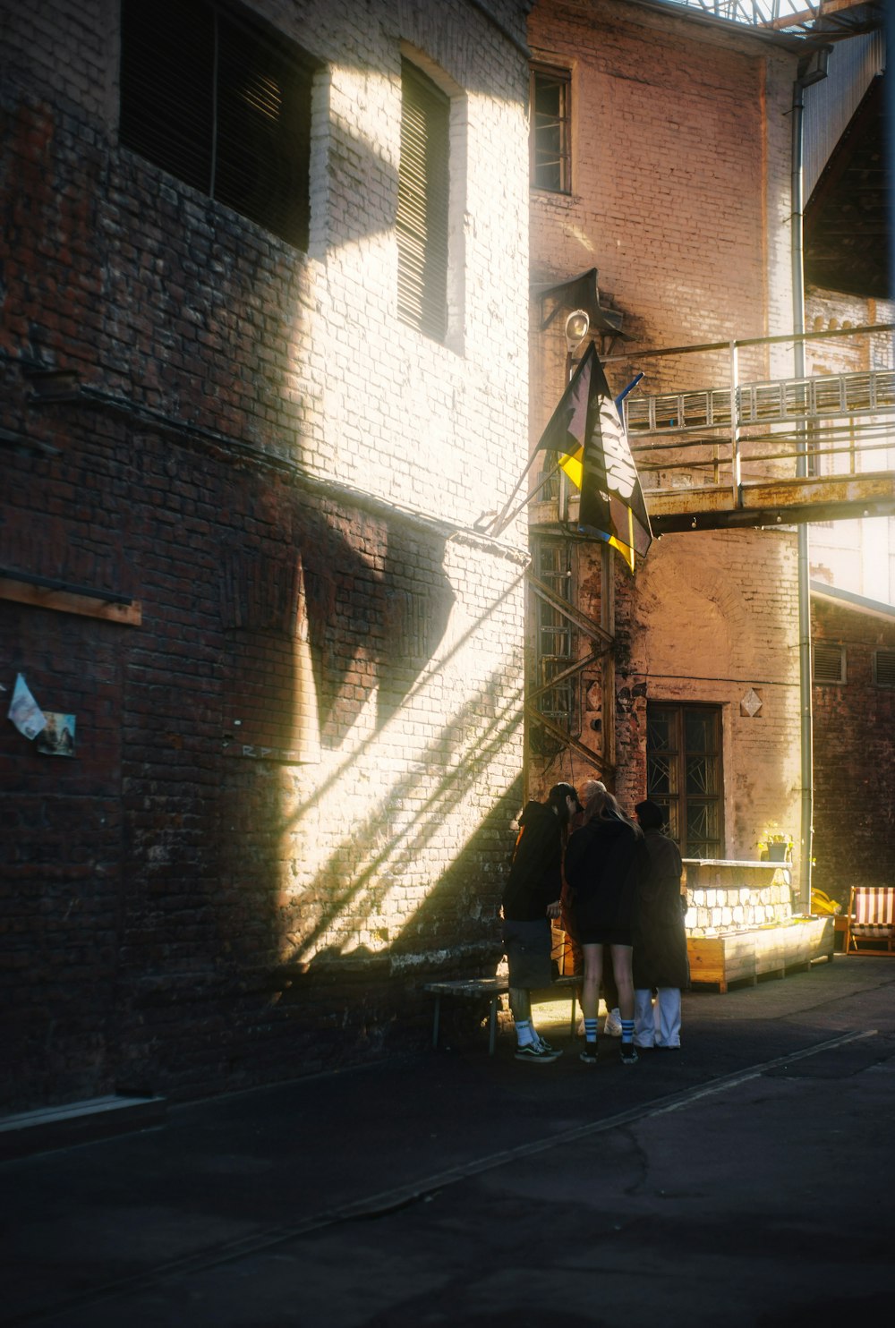 a group of people standing outside of a building