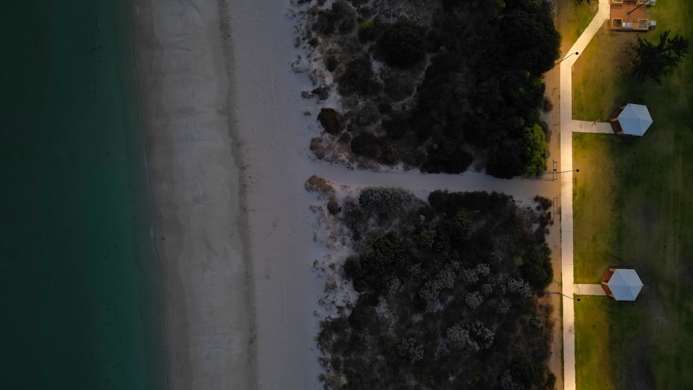 a bird's eye view of a beach and a body of water