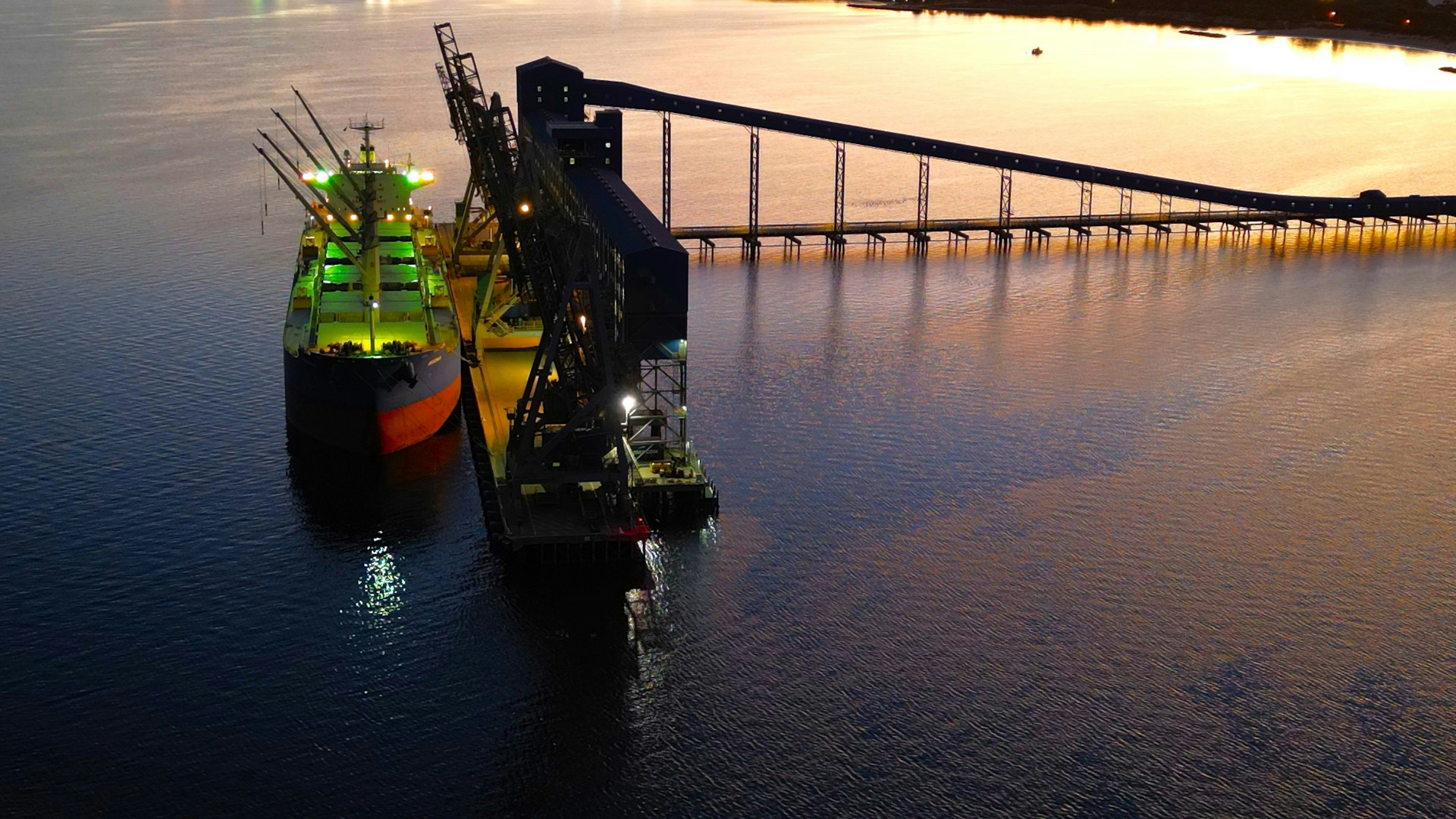 a large boat floating on top of a large body of water