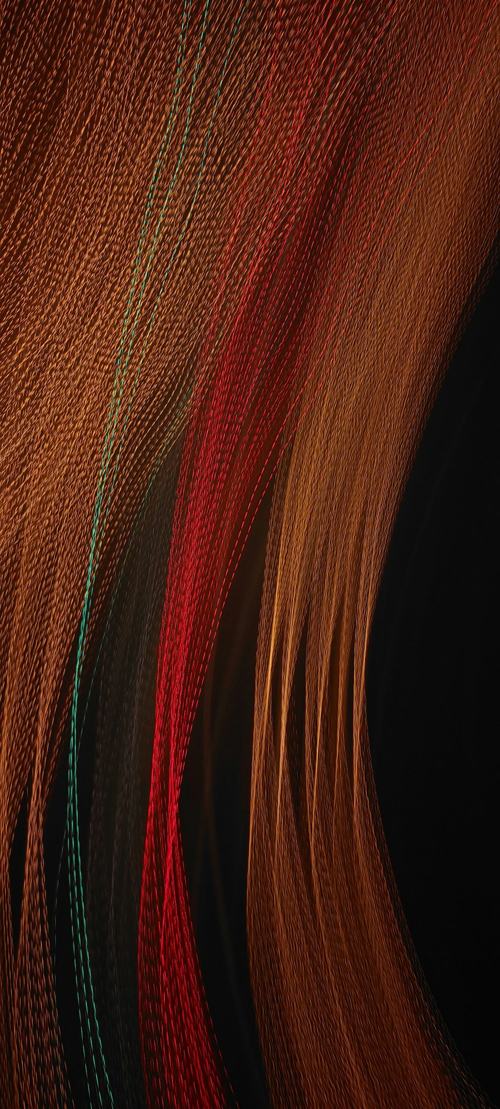 a close up of a red, orange, and green abstract background