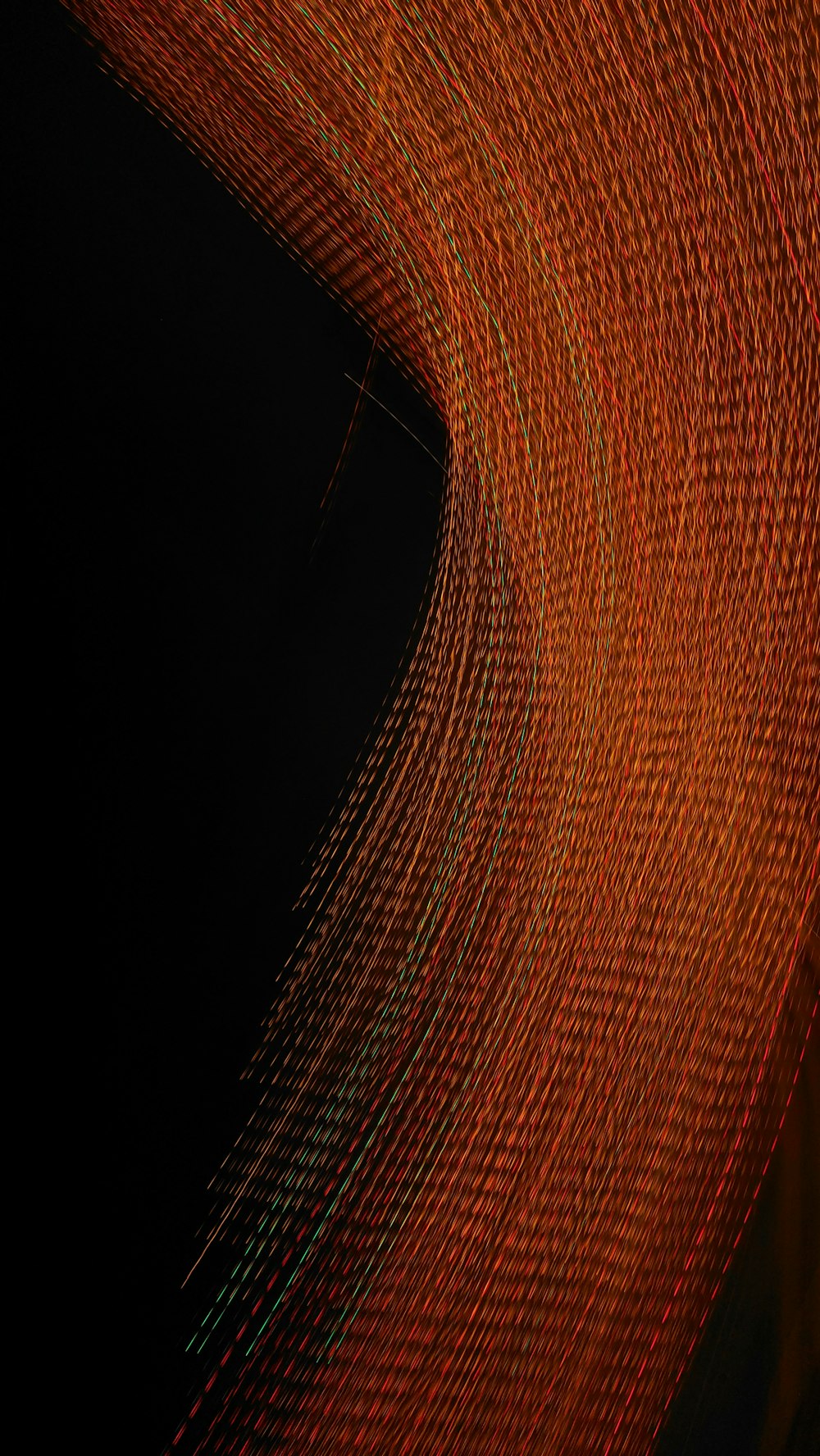 an abstract photograph of orange and red lines