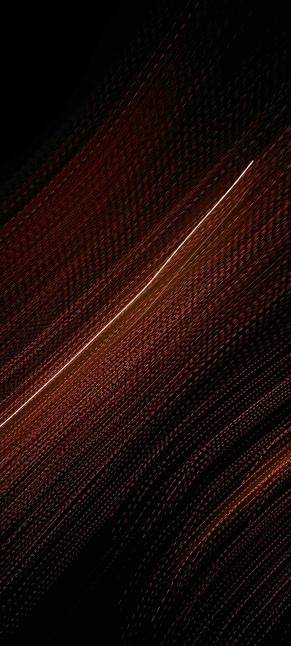 a plane flying through a dark sky with a streak of light