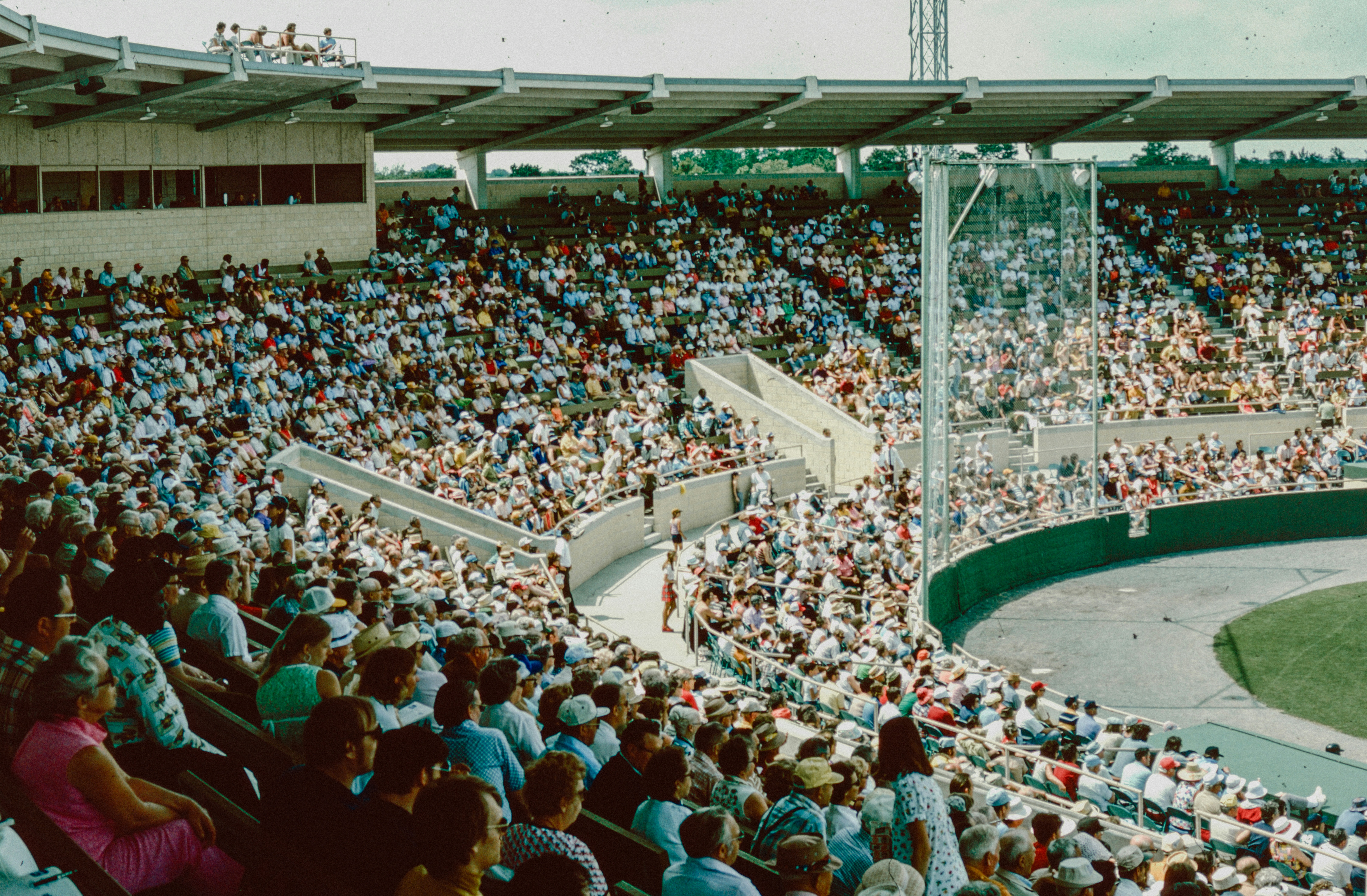 Crowd cheering at a tennis match