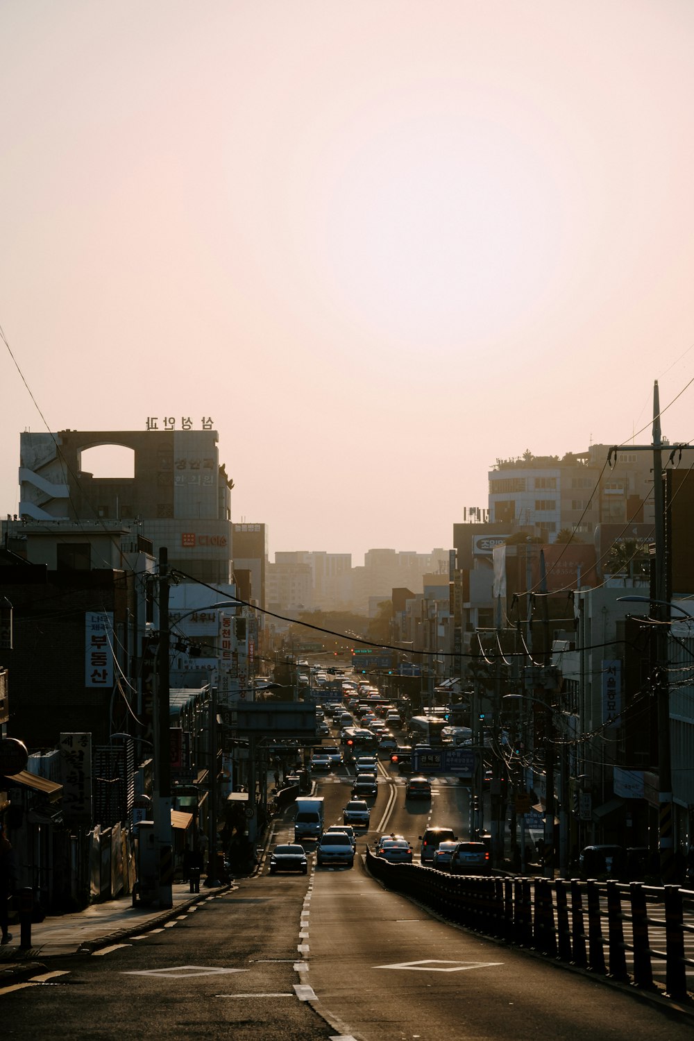 a city street filled with lots of traffic