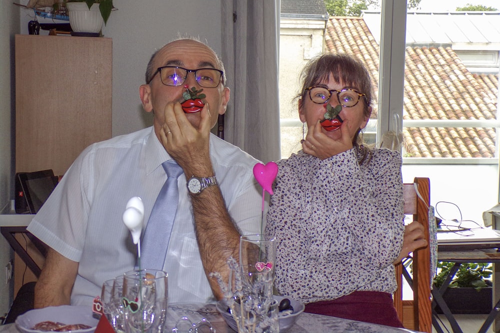 a man and a woman sitting at a table