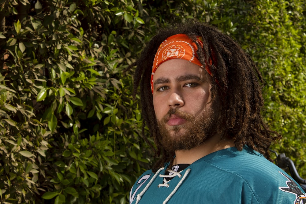 a close up of a person wearing a headband