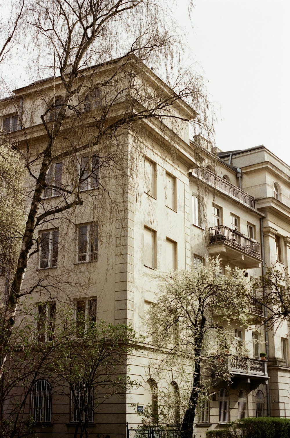 a tall building with a clock on the front of it