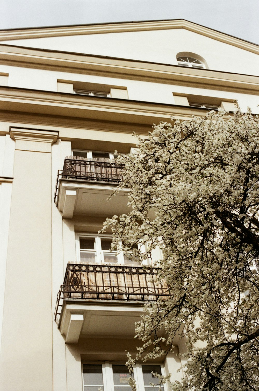 a tall building with balconies and balconies on the balconies