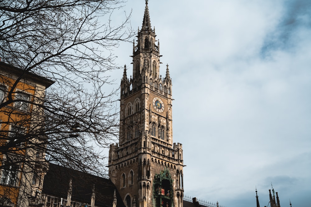 a tall tower with a clock on the top of it