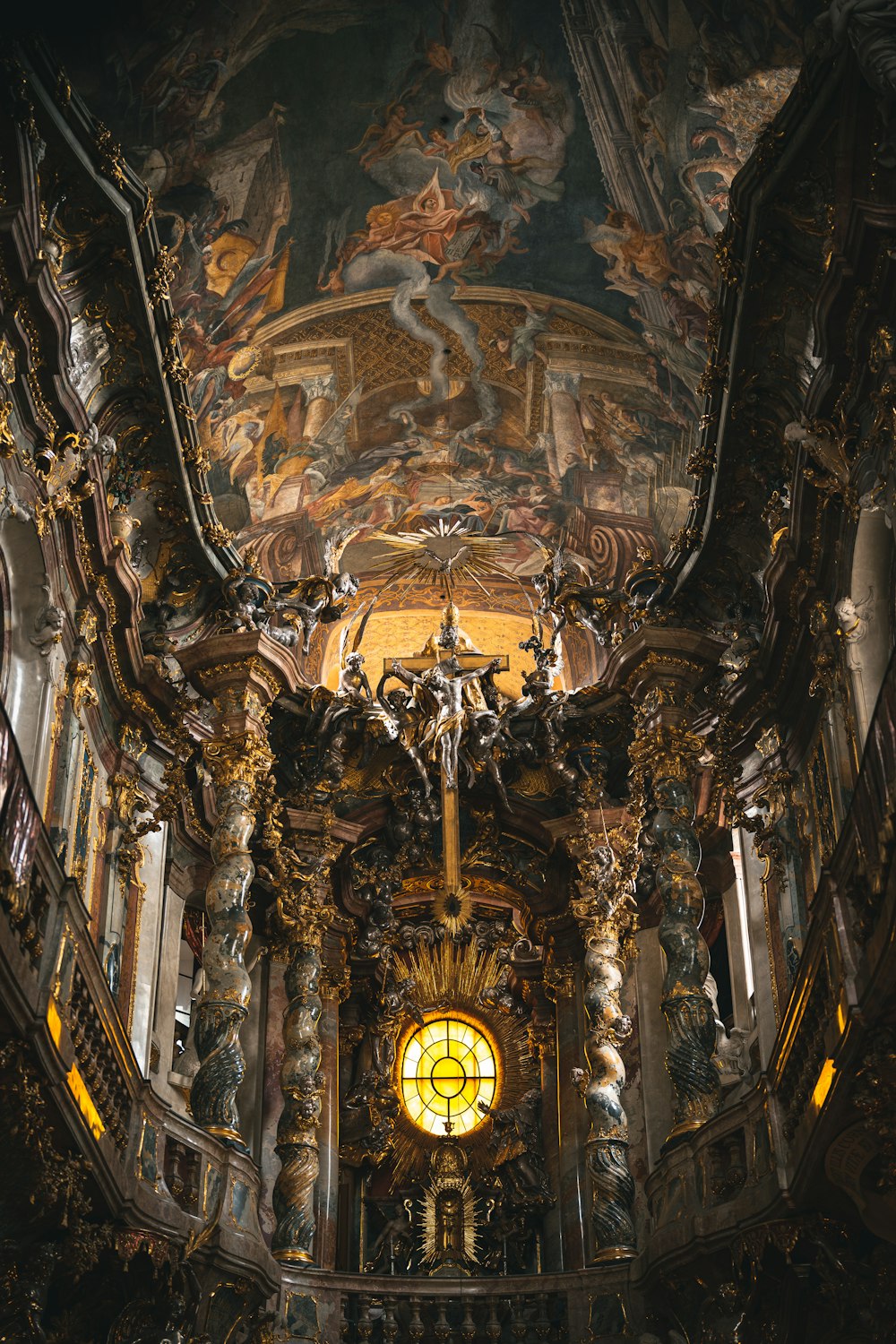 a very ornate church with a stained glass window