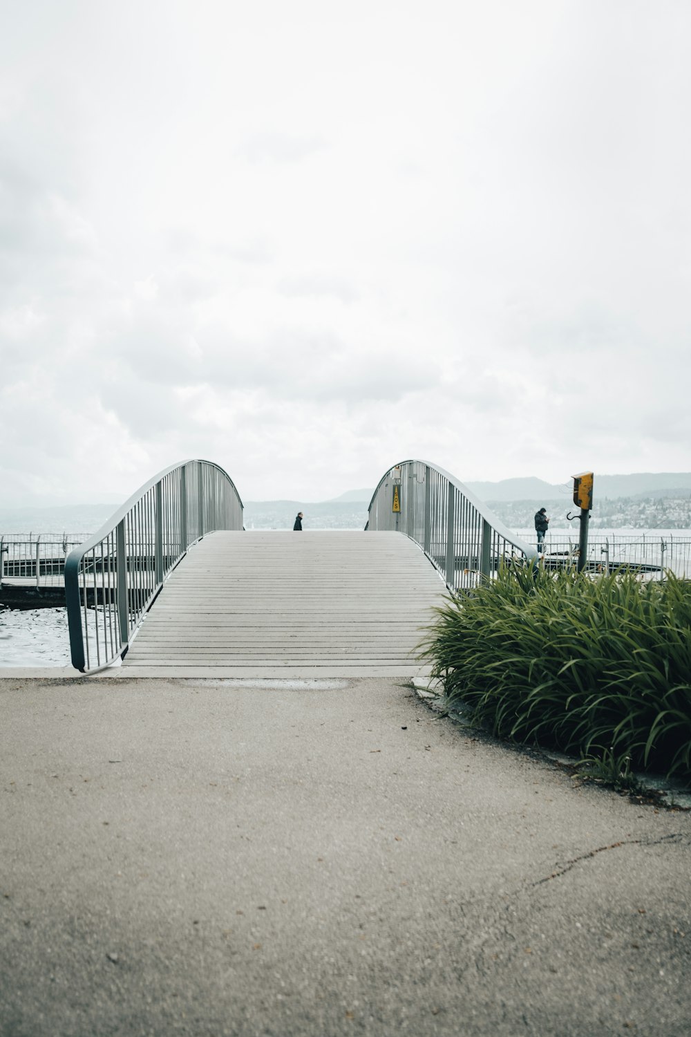 a wooden bridge over a body of water