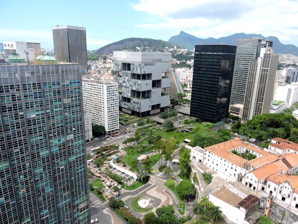 an aerial view of a city with tall buildings