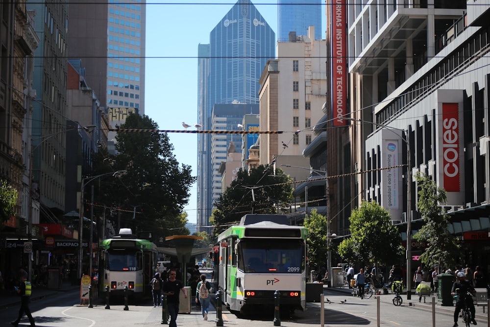 a city street filled with traffic and tall buildings