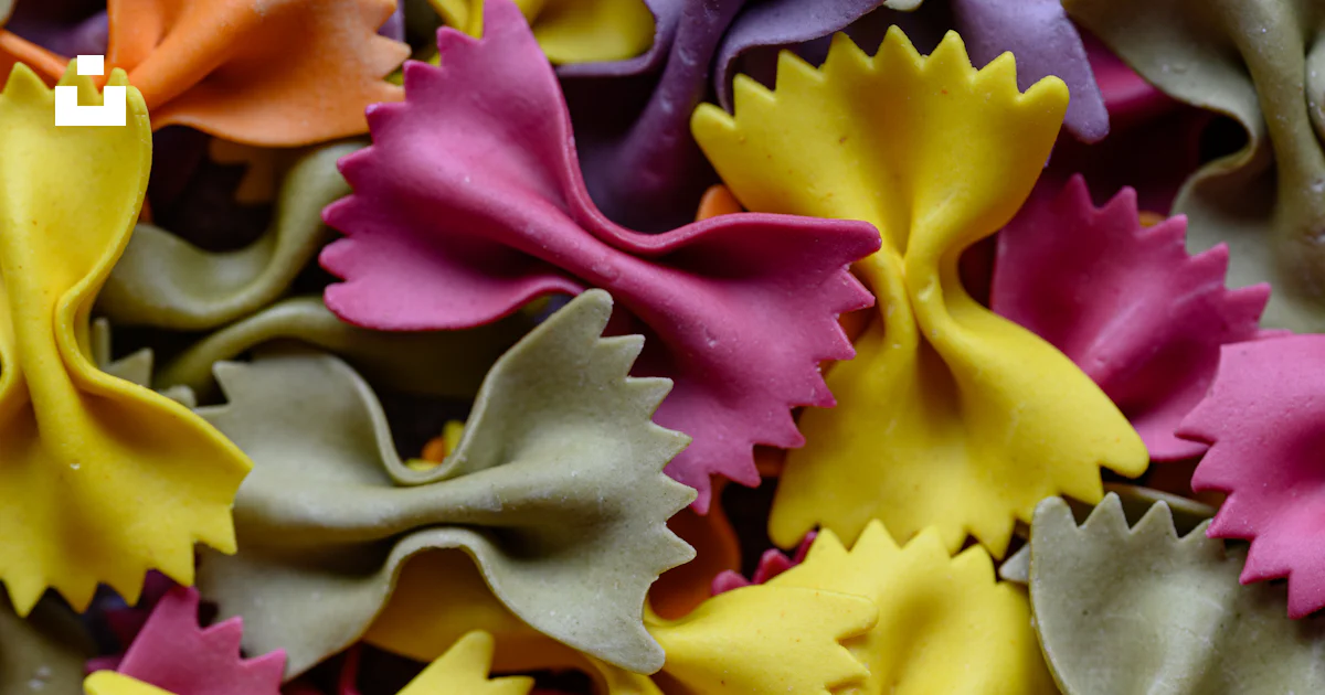 A close up of a bunch of different colored pasta photo – Free Pasta ...