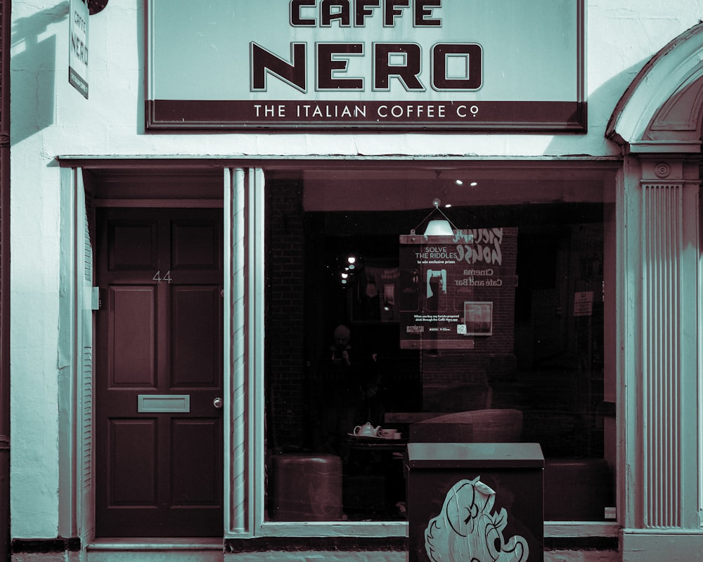 a coffee shop with a sign that says cafe nero