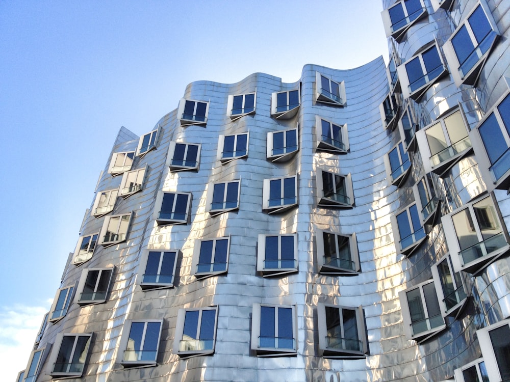 a tall building with lots of windows on the side of it