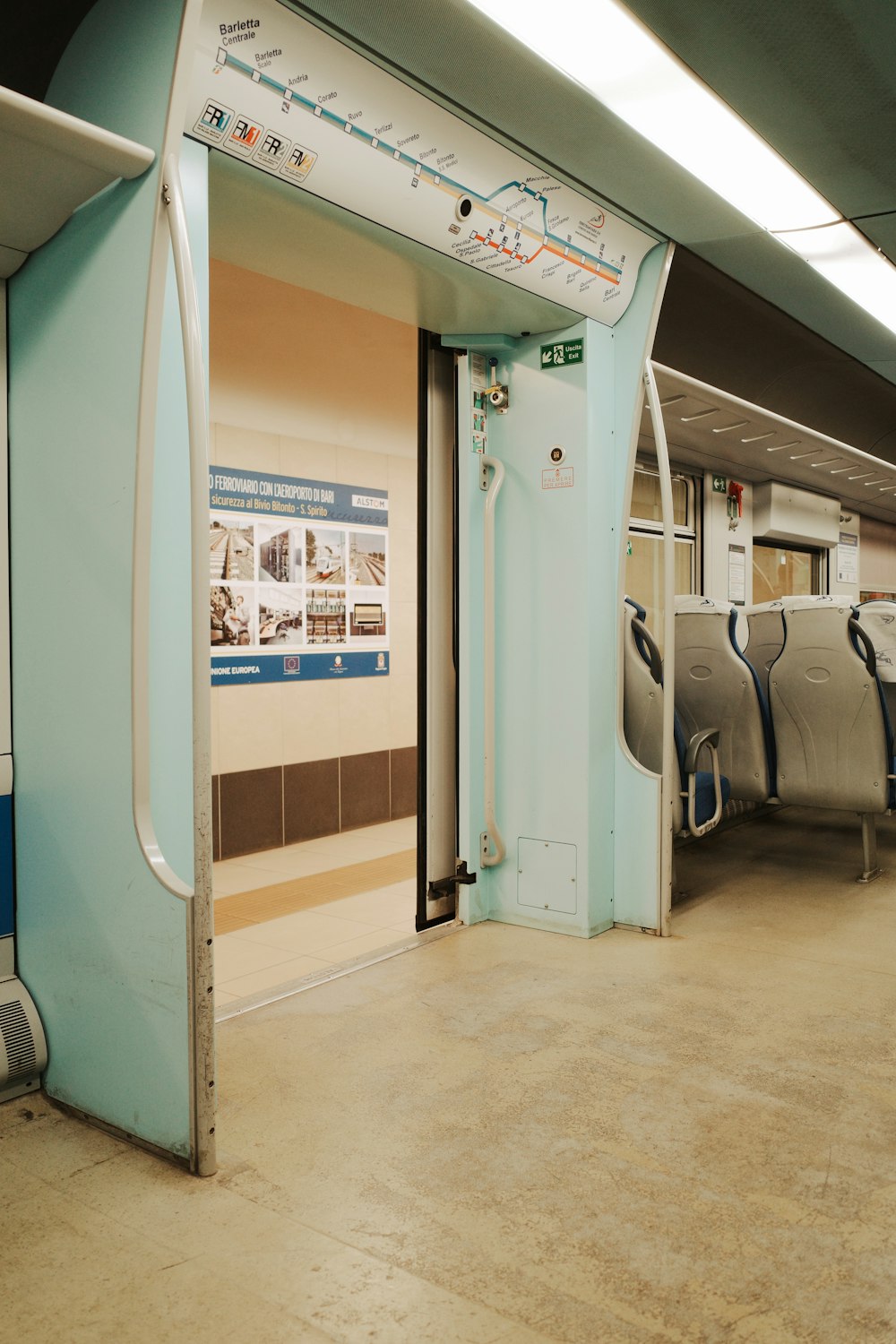 an empty train car with its doors open