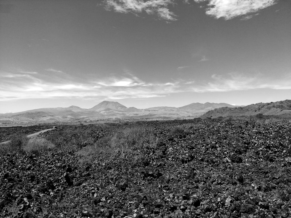 a black and white photo of a mountain range