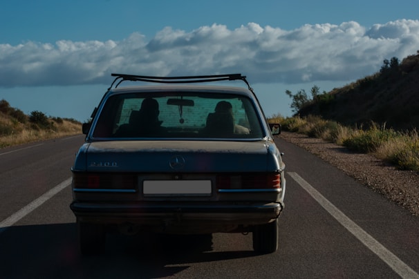 a car is parked on the side of the road