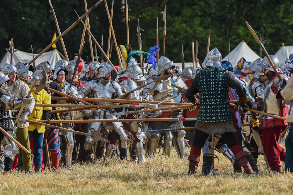 a large group of people in medieval costumes