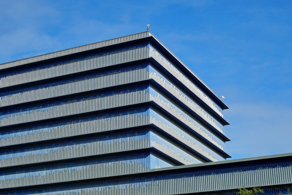 a tall building with a clock on the top of it