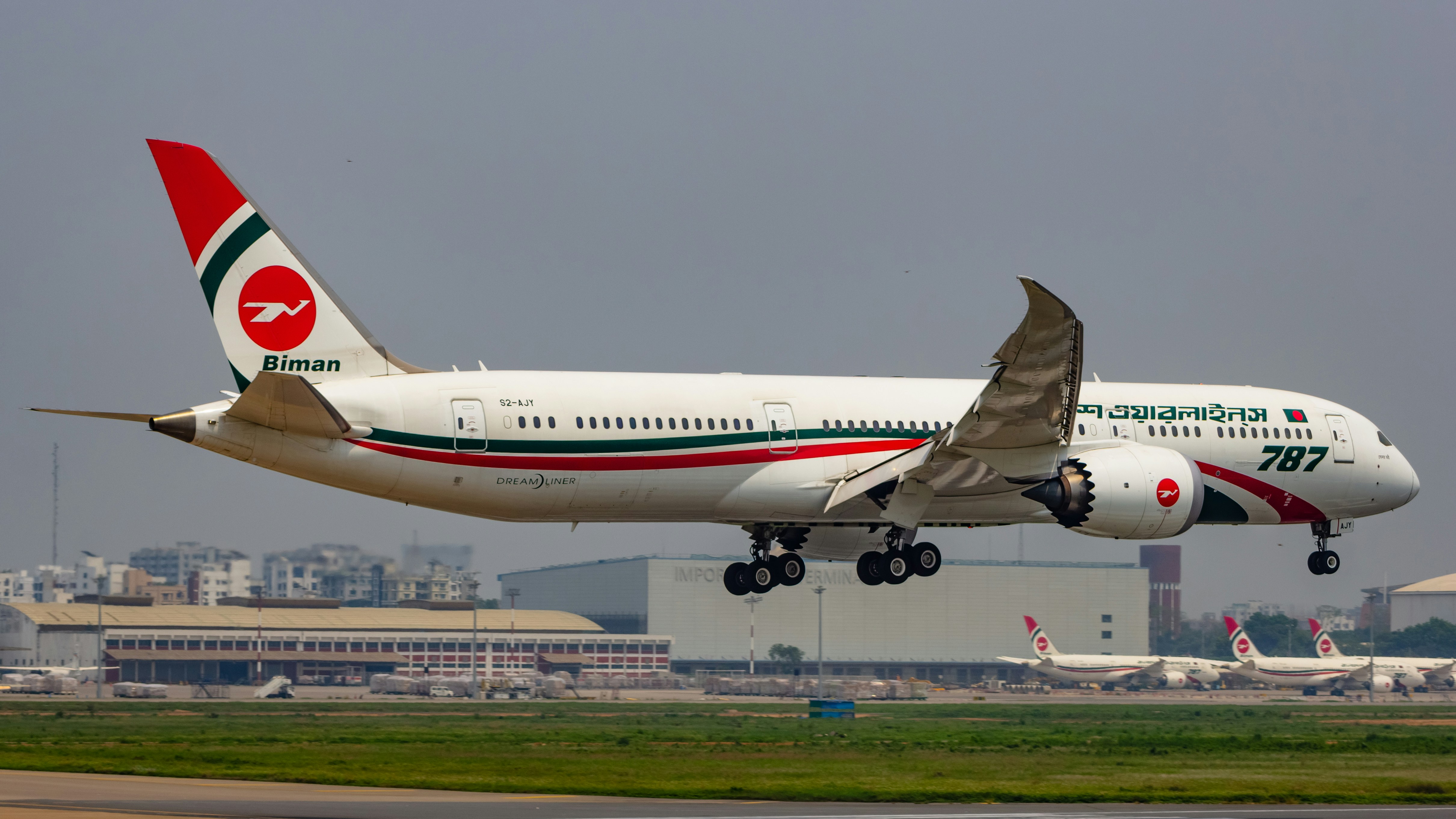 a large jetliner taking off from an airport runway, Biman Bangladesh Airlines | Boeing 787-9 Dreamliner