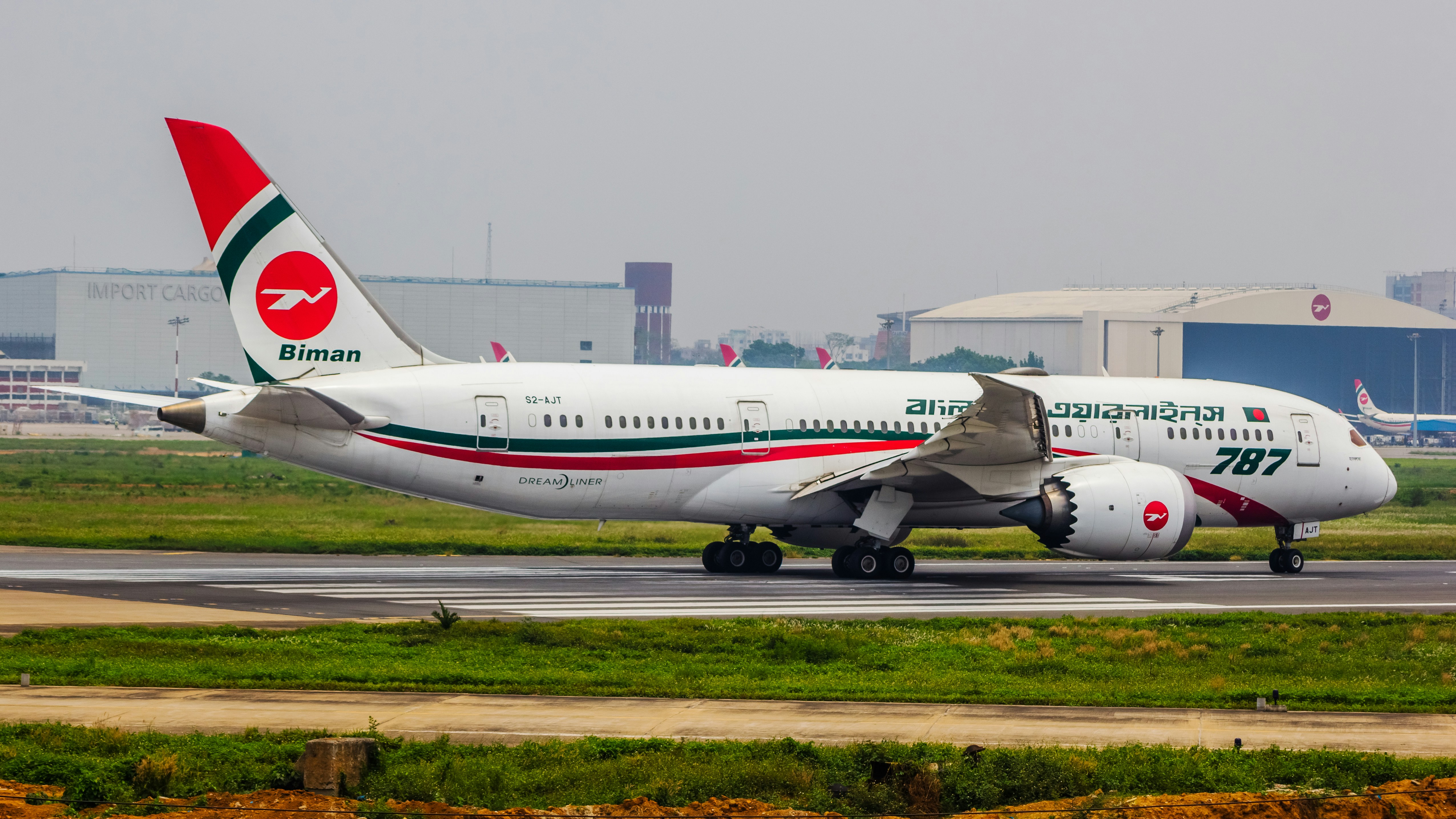a large jetliner sitting on top of an airport runway, Biman Bangladesh Airlines | Boeing 787-9 Dreamliner