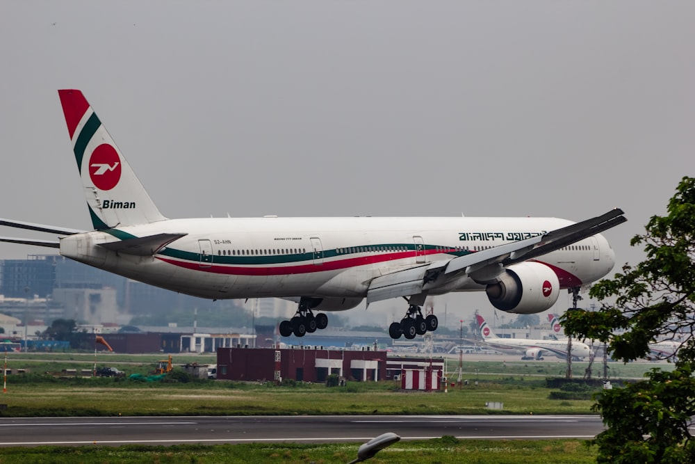 a large jetliner taking off from an airport runway