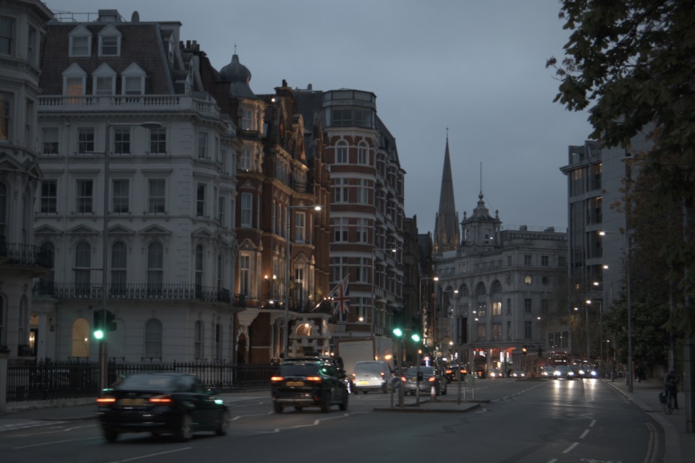 a city street filled with lots of tall buildings