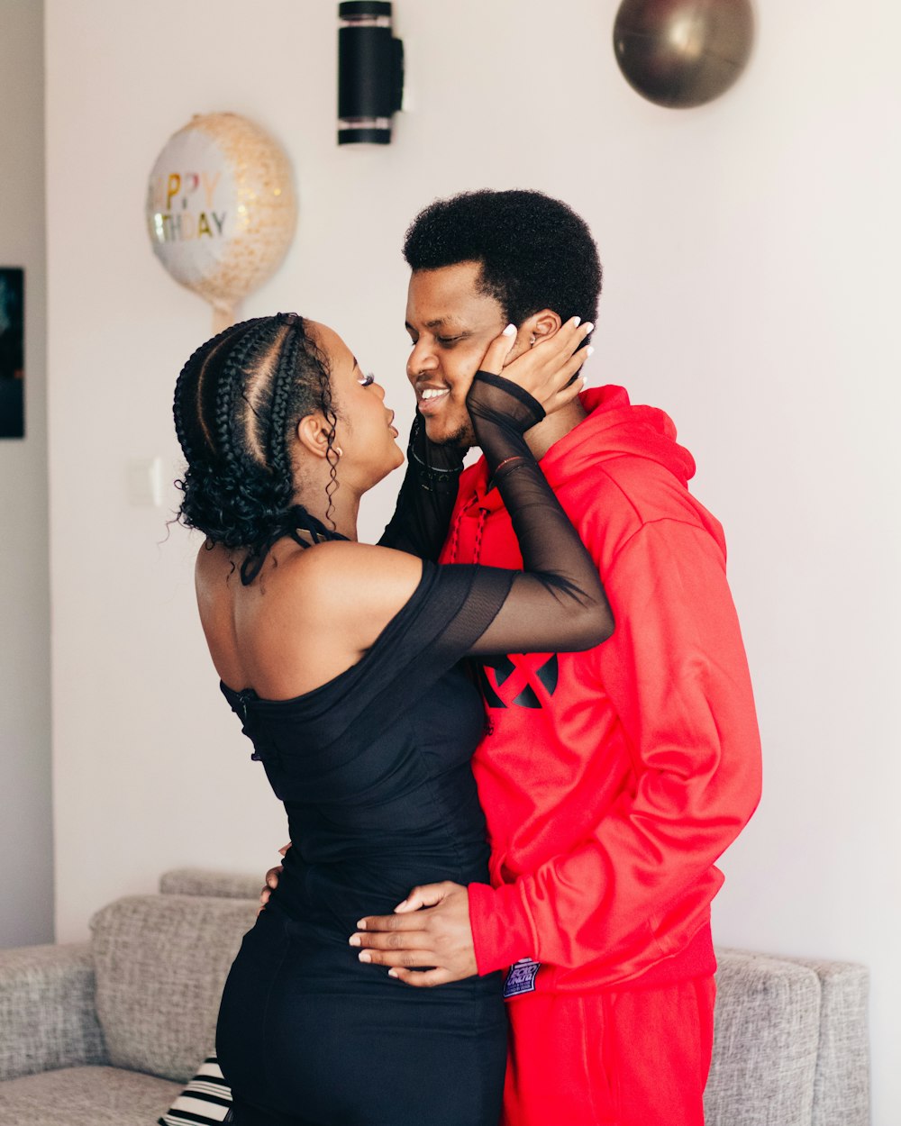 a man and a woman standing next to each other