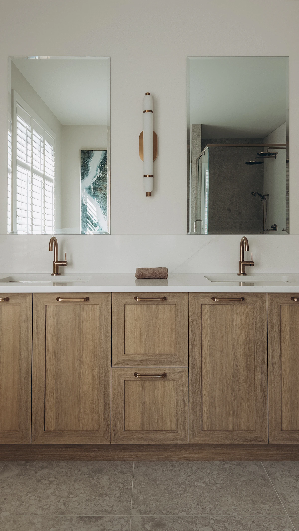 Bathroom lighting positioned according to wet and dry zones