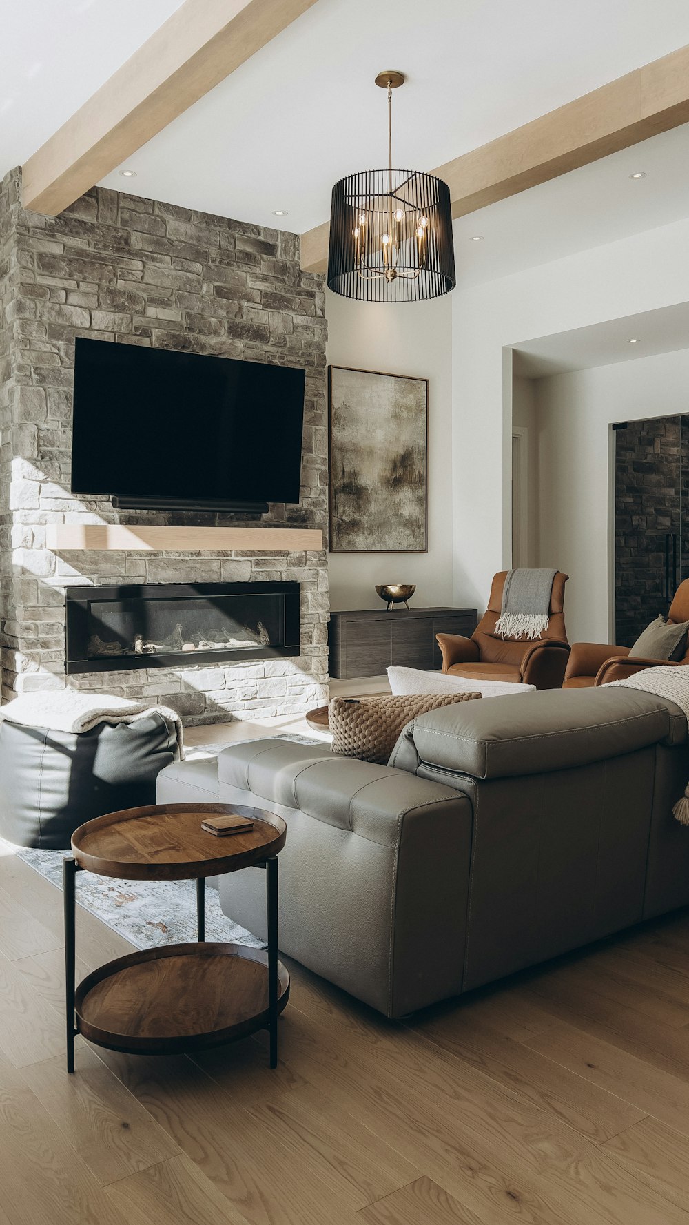 a living room filled with furniture and a flat screen tv