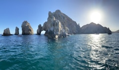 a group of rock formations in the ocean