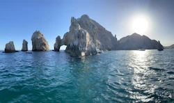 a group of rock formations in the ocean