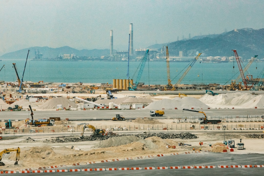 complex dam construction site with heavy machinery - Dam construction companies complex dam construction site with heavy machinery - Dam construction companies