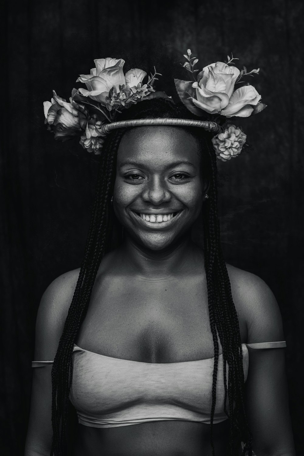 a woman with a flower crown on her head