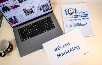 a laptop computer sitting on top of a desk