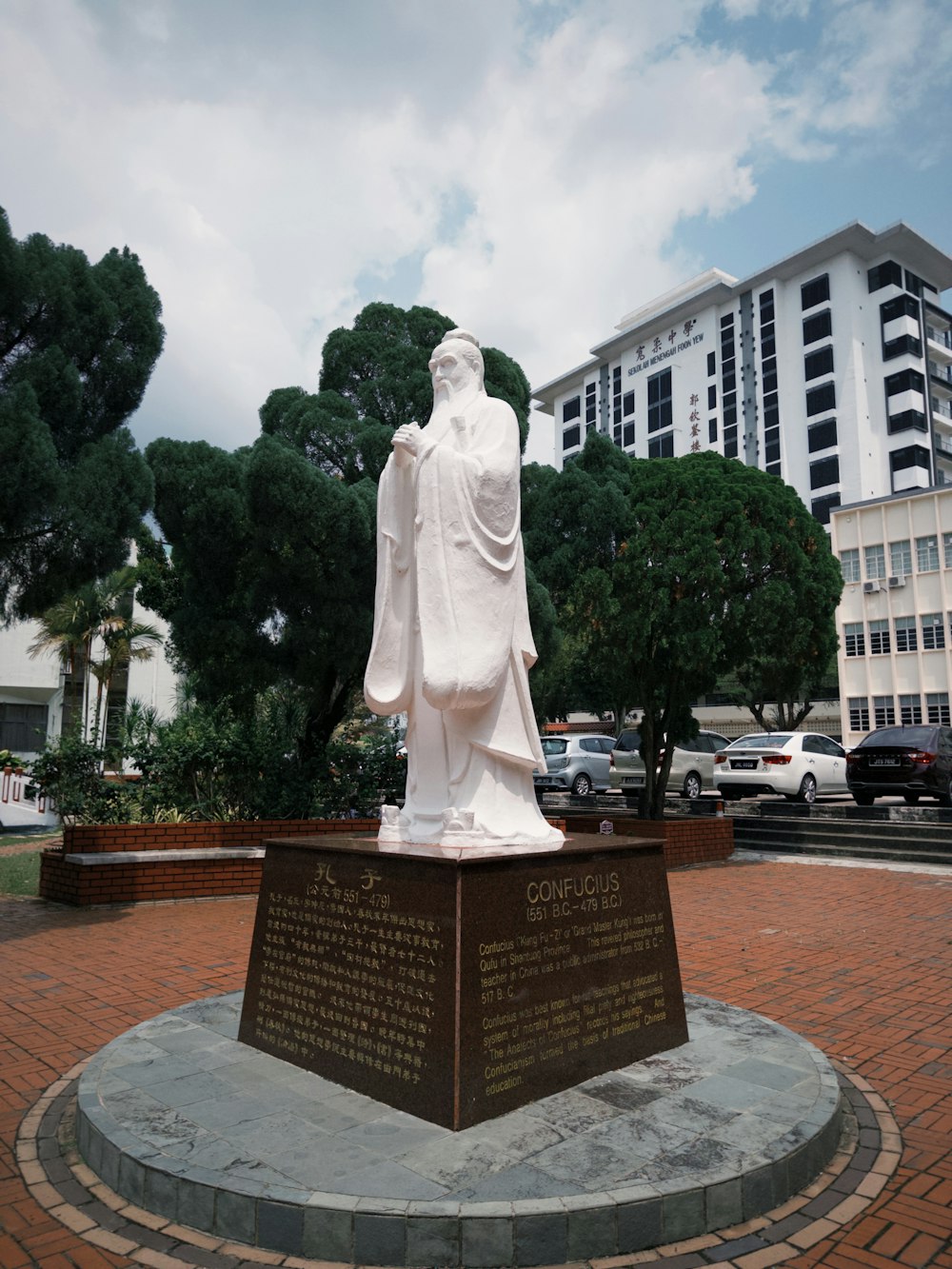 a statue of a person with a robe on