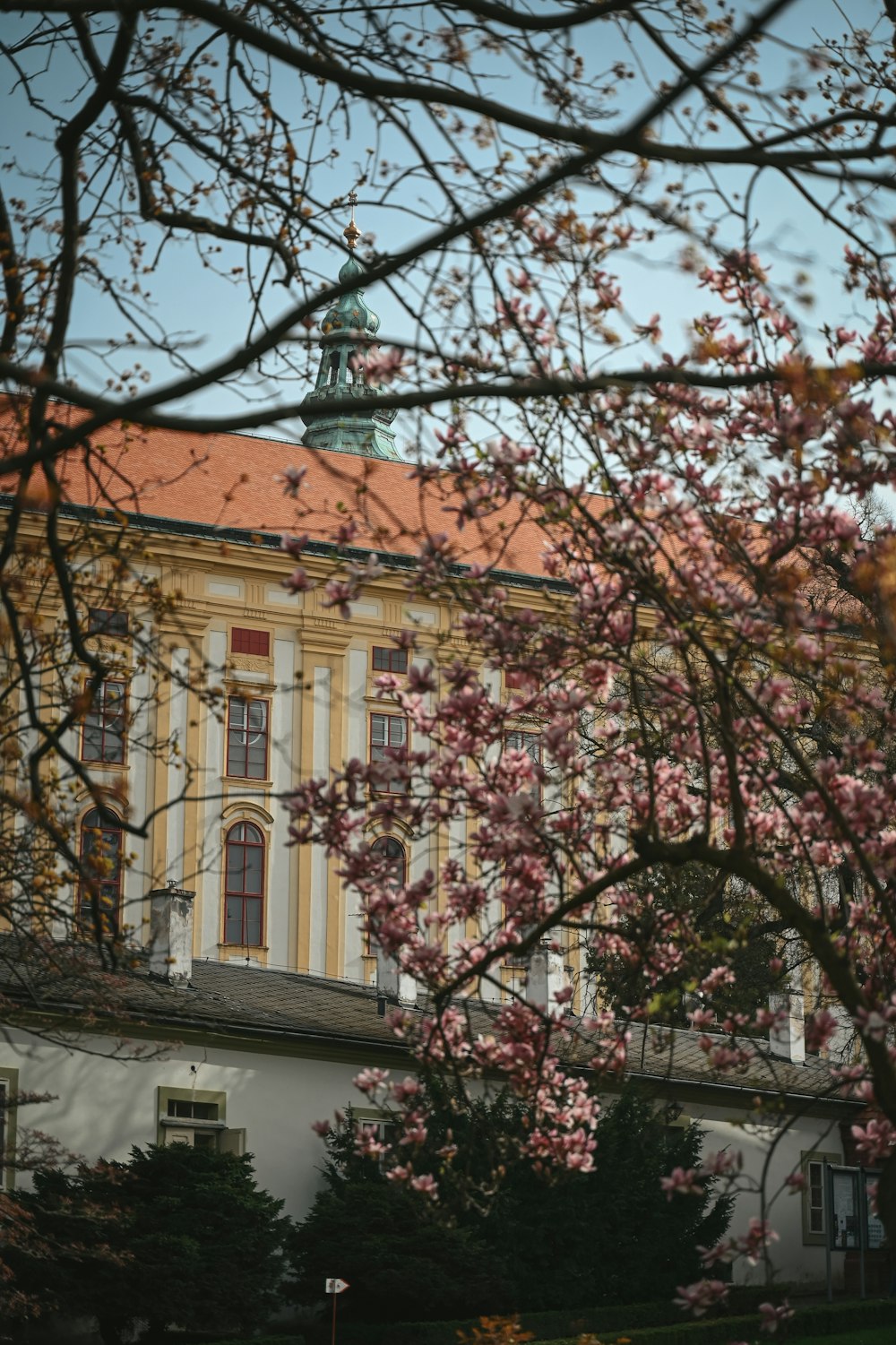 a large building with a clock on the top of it