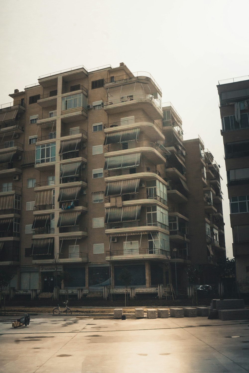 a tall building with balconies and balconies on the balconies